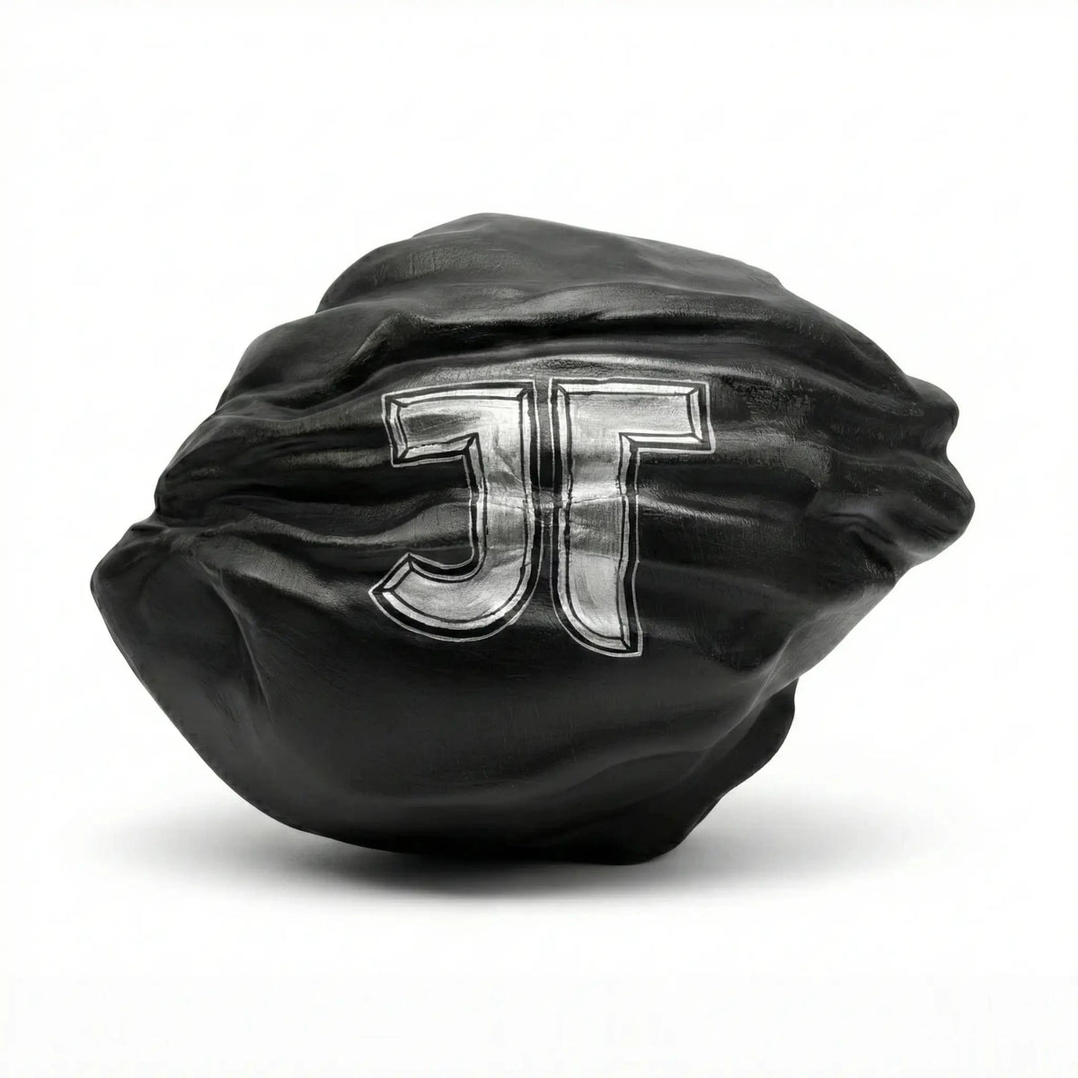 Rust JTeles Rock prop, black Big Rock with the silver JT monogram, front view