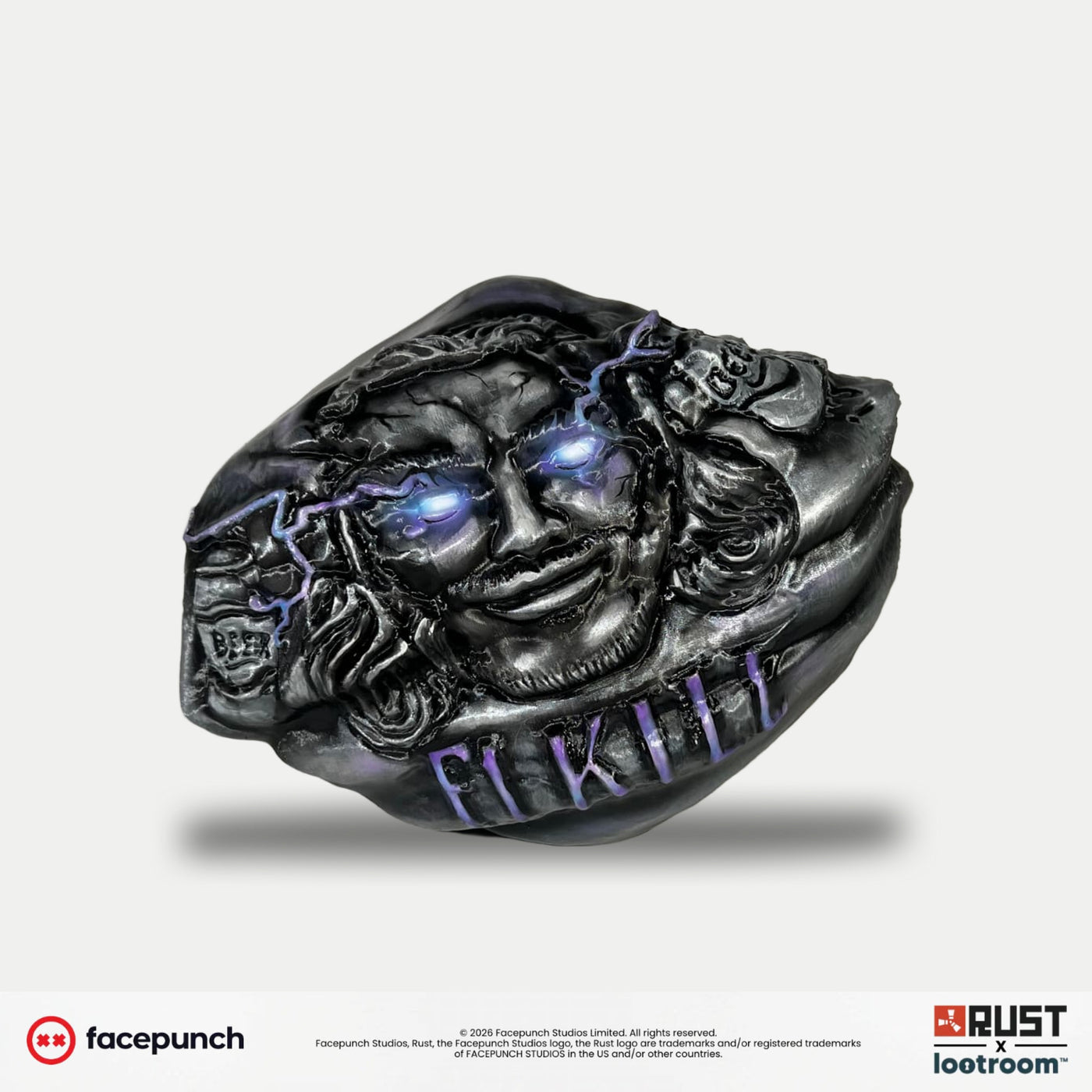 Rust Throat Rock prop, dark gunmetal with a bearded face, glowing pale-blue eyes and violet lightning, F1 KILL lettering across the front