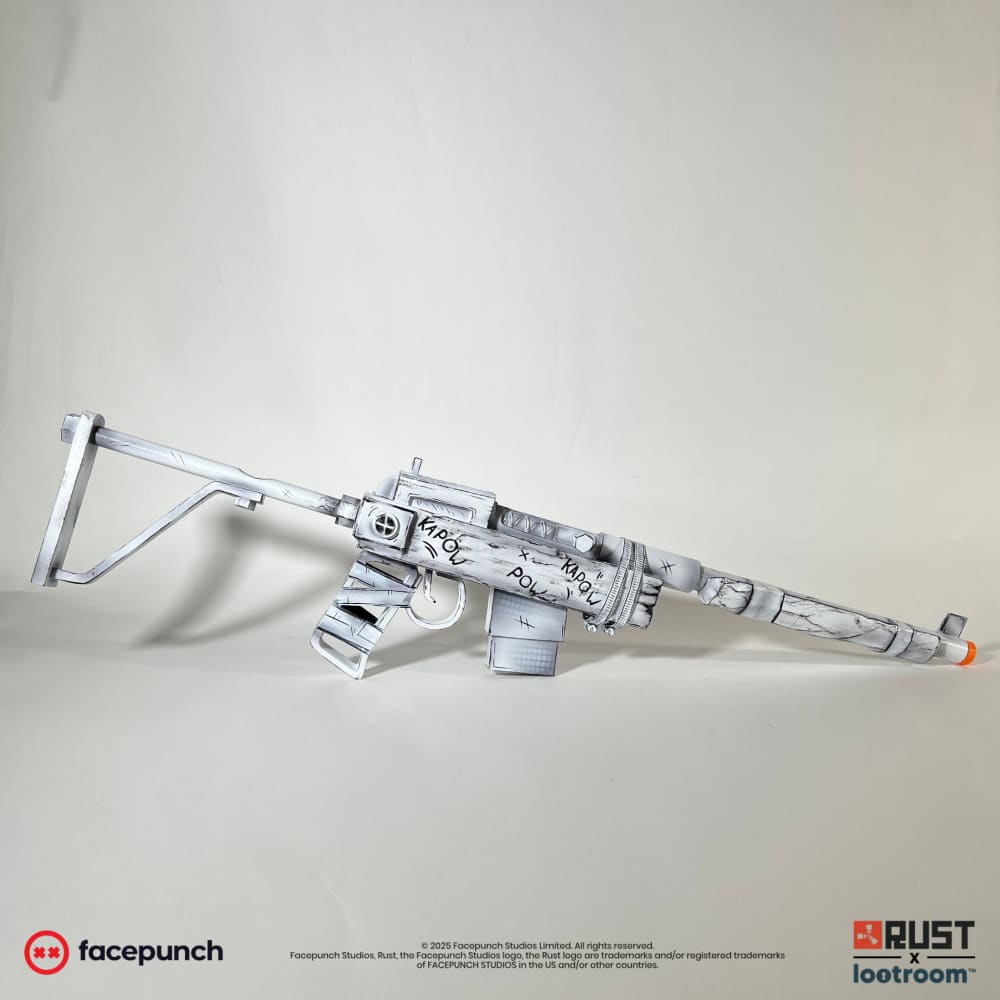 Rust Comics SAR prop from the side, white with black ink lines drawn along every edge.