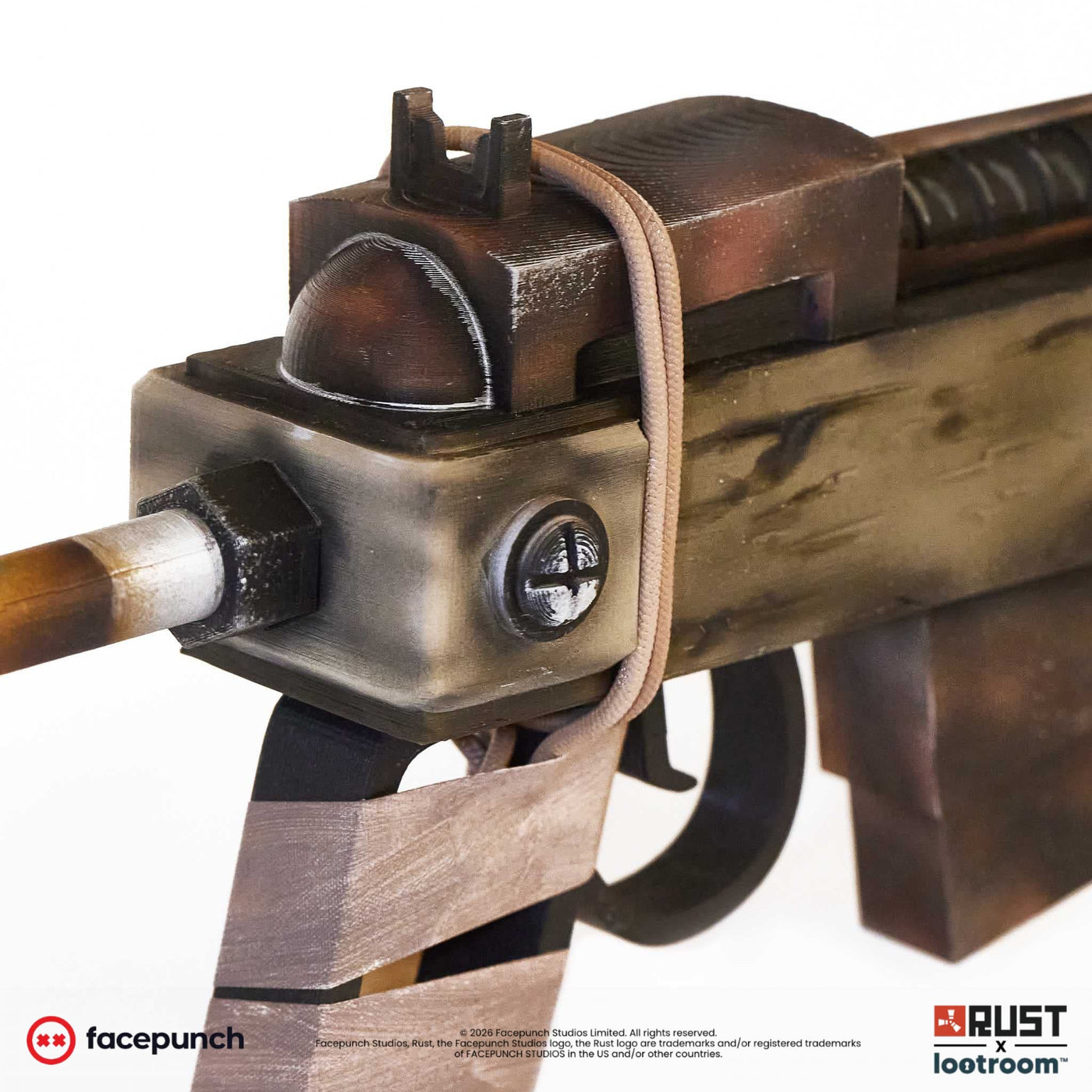 Close-up of the Rust SAR receiver with the cord looped over it and the painted wood grain