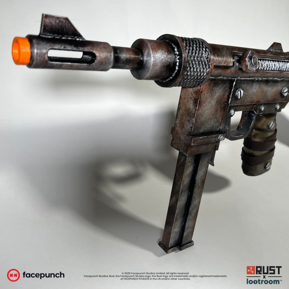 The front of the Rust SMG prop seen from below, with the front sight, the knurled sleeve and the magazine.