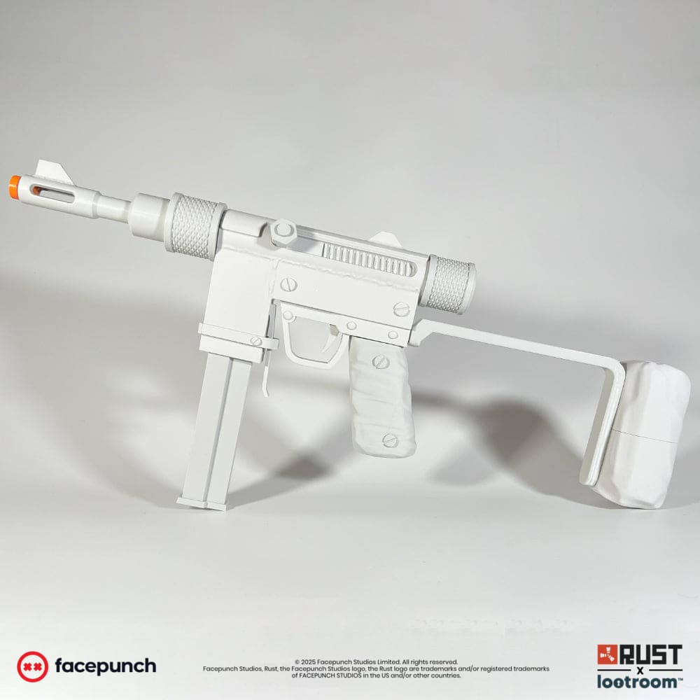 Rust Custom SMG DIY prop in unpainted light grey, three-quarter view with the rod-look stock and the knurled sleeves on the barrel.