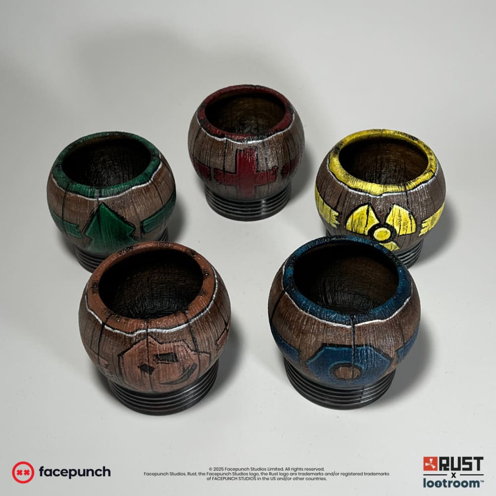 The five Rust Pure Tea props from above, each open cup with its own coloured rim
