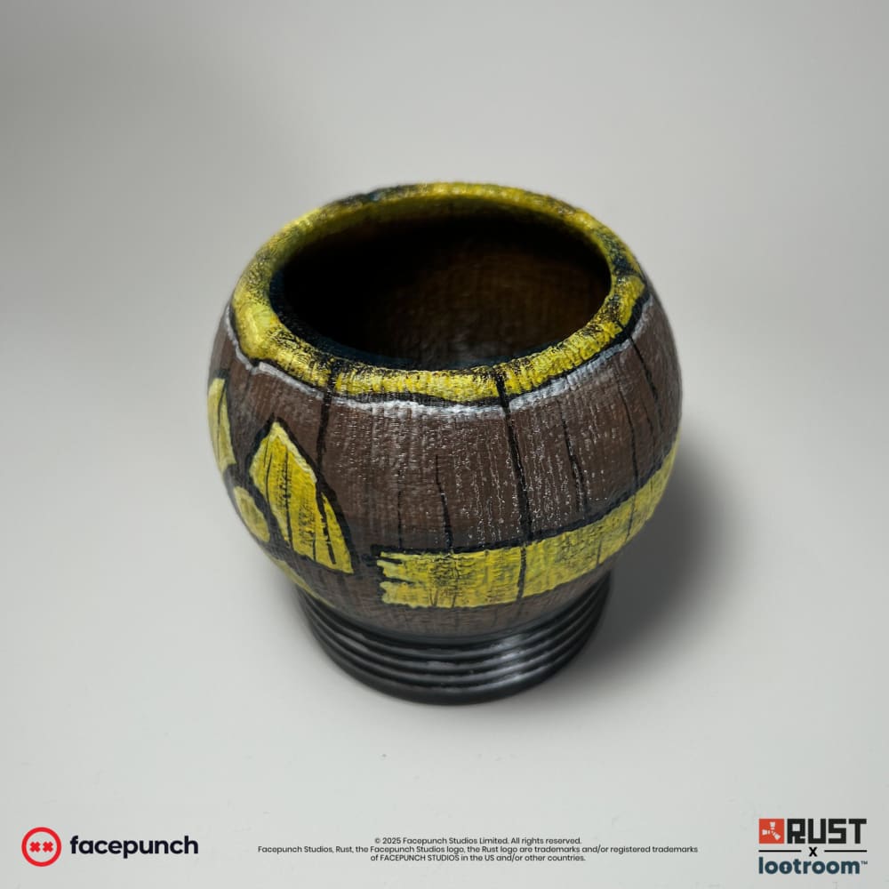 Rust Pure Anti-Rad Tea prop from above, the open cup with its yellow-painted rim