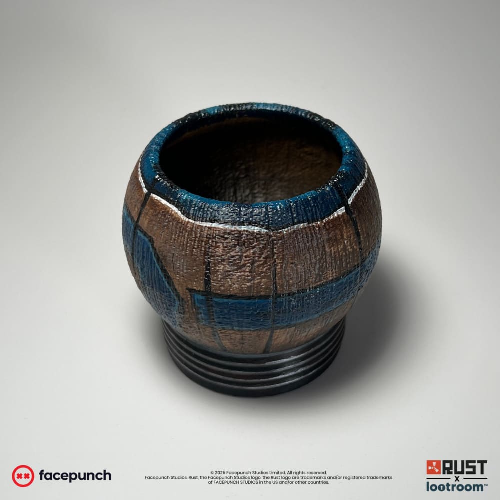 Rust Pure Scrap Tea prop from above, the open cup with its blue-painted rim